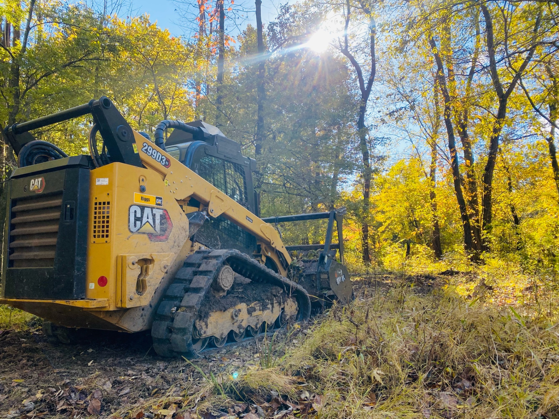 Outdoor Services Group heavy equipment on a land clearing job site in Tipton County